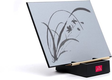 The 40 Best Unique Gift Ideas for Any Occasion in 2021 | SPY Buddha Board Art, Buddha Board, Brush Stand, Art Of Letting Go, Living In The Moment, Bamboo Brush, Drawing Table, Relaxation Gifts, Painted Boards