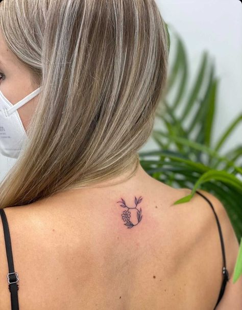 Daisy Taurus Tattoo, Women Taurus Tattoo, Taurus Neck Tattoo, Minimalist Tattoo Taurus, Taurus Line Tattoo, Taurus Inspired Tattoos, Taurus Fine Line Tattoo, Symbol Back Tattoo, Taurus Back Tattoo