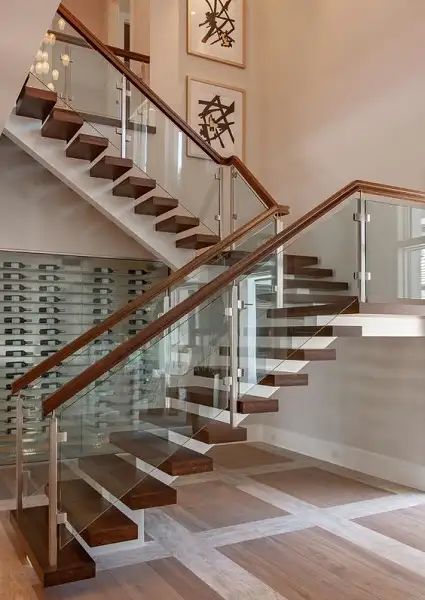 Stainless Steel And Glass Stair Railing, Staircase Design Glass Railings, Glass Staircase Railing Stainless Steel, Glass Stairs Design Modern, Modern Stair Railing Stainless Steel, Stairs Glass Railing Design, Glass For Stairs, Railing Design Stairs, Stairs With Glass Railing