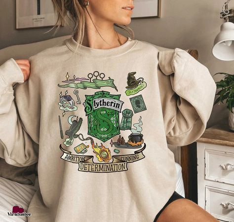 Vintage Slytherin Harry Potter Crewneck Sweatshirt, Hogwarts Sweatshirt Check more at https://viralustee.com/product/vintage-slytherin-harry-potter-crewneck-sweatshirt-hogwarts-sweatshirt/ Hogwarts Sweatshirt, Slytherin Harry, Slytherin Harry Potter, Shirt Ideas, Hogwarts, Crewneck Sweatshirt, Harry Potter, Crew Neck Sweatshirt, Cute Outfits