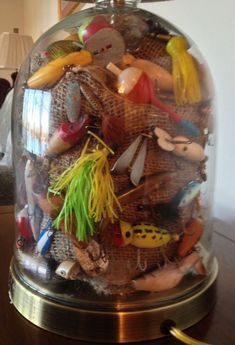 Great way to display my Dad's old fishing lures.  Great way to display my Dad's old fishing lures. Fishing Pole Display Ideas, Fishing Lure Shadow Box Ideas, Lure Display, Fishing Bedroom, Fishing Lures Display, Vintage Lures, Old Fishing Lures, Diy Fishing Lures, Fishing Cabin