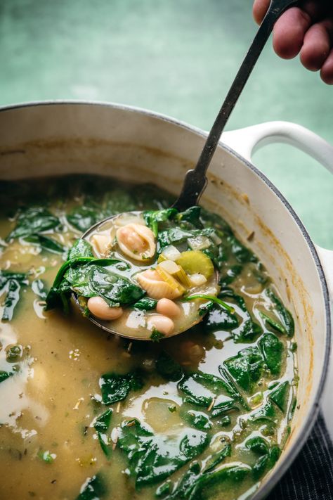 This brothy, comforting, simple vegan White Bean Spinach Soup comes together in just 30 minutes! It's so easy to make, packed with plant-based protein and fiber, and tastes great as leftovers the next day. This is the easiest vegan soup to add to your meal plan this winter! White Bean Spinach Soup, White Bean Spinach, Bean Food, Easy Vegan Soup, Veggie Box, Crowded Kitchen, Soup Maker, Soup Vegan, Cooking Soup