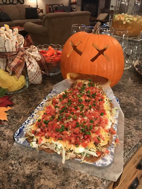 Pumpkin Puke Dip, Pumpkin With Dip Coming Out Of Mouth, Hot Food For Halloween Party, Halloween Lucky Dip, Halloween Game Night Snacks, Dip For Halloween Party, Taco Halloween Food, Pumpkin Throwing Up Dip, Thanksgiving Ideas For Small Family