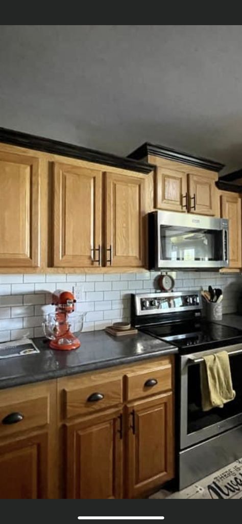 Honey Oak Cabinets Black Countertop, Oak Cabinets With Black Countertops, Wood Cabinets And Black Countertops, Matte Black Kitchen Hardware, Honey Oak Kitchen Cabinets, Black Kitchen Hardware, Honey Oak Cabinets, Matte Black Kitchen, Black Kitchen Sink