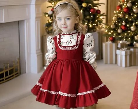 cute little girl with blonde hair is wearing a long sleeved red christmas dress with white shirt detail and posing with innocent smile. Kids Christmas Dress Outfit, Christmas Dress Baby Girl, Girls Christmas Dress Pattern, Christmas Outfit For Kids, Christmas Dress For Kids, Toddler Girl Christmas Dress, Simple And Elegant Dress, Christmas Red Dress, Baby Girl Christmas Dress