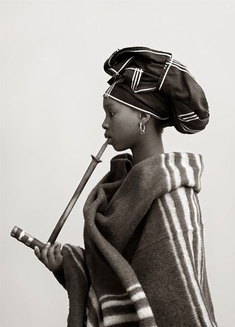 AmaXhosa - Stevenson Gallery's website. These Cape Tonians were photographed in their traditional dress by Andrew Putter as part of a body of work he produced titled Native Work. They are all Xhosa. The sitters were asked to dress themselves in a way they see themselves traditionally. Xhosa Attire, African Life, Steve Mccurry, Black Photography, African People, We Are The World, Arte Sketchbook, Black And White Portraits, People Of The World