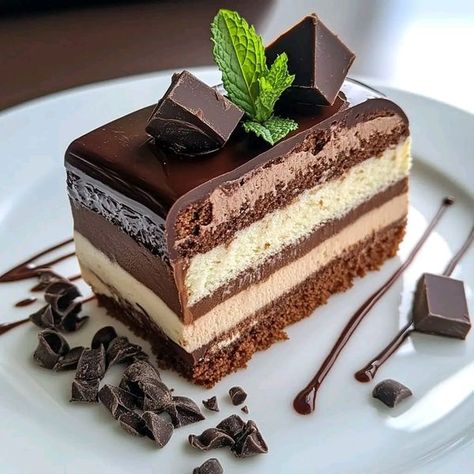 Martha Stewart Recipes | Triple Chocolate Mousse Torte | Facebook 3 Layer Chocolate Mousse Cake, Chocolate Mousse Torte, Triple Chocolate Mousse, Triple Chocolate Mousse Cake, Dark Chocolate Mousse, Martha Stewart Recipes, Tiramisu Recipe, Deli Food, Chocolate Mousse Cake