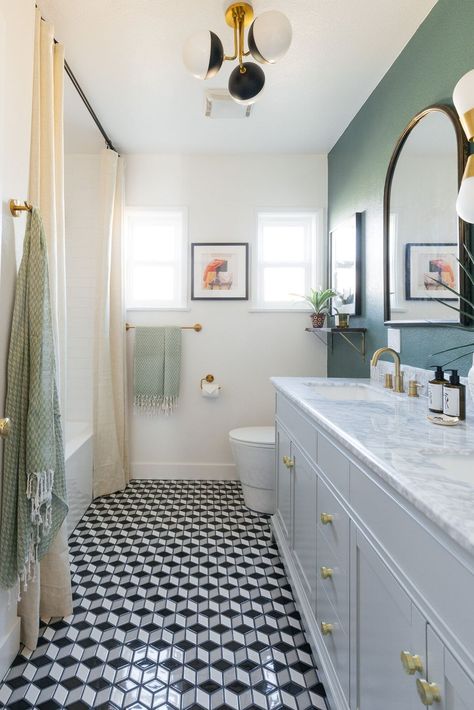 The super plain tiles that previously graced the floors of this bathroom were replaced with smaller black, white, and gray tiles that form a tiny hexagon pattern. Art Deco Bathrooms, Tiny Bath, Affordable Tile, Standing Shower, White Tub, Bathroom Transformation, Art Deco Bathroom, Deco Bathroom, Bathroom Remodel Ideas