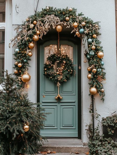 Transform your home's exterior with stunning Christmas house facade decorations. Explore creative ideas like twinkling lights, oversized wreaths, and personalized touches to make your house a holiday standout. Browse Pinterest for inspiration and tips to create a magical and welcoming festive display. Row House Christmas Decorations, Front Door Garland Christmas, Christmas Garland Front Door, Facade Decoration, Door Decoration Ideas, Christmas Door Decoration, Christmas Front Door, Front Door Christmas Decorations, Natural Christmas Decor