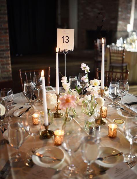 Small Vases Wedding Table, Candlestick And Bud Vase Centerpiece, Candles Round Table, Round Table Floral Arrangements, Circle Table Centerpiece Bud Vases, Bud Vases And Taper Candles Centerpiece, Single Stem Centerpiece Round Table, Bud Vases On Round Table, Round Table With Bud Vases