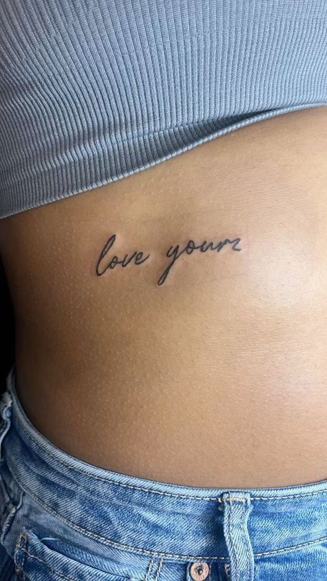 I Love My Wife Tattoo, Simple Rib Cage Tattoos For Women, Tattoo Idea Ribs Women, Jcole Tattoo Ideas Lyrics, Rib Cursive Tattoo, Rib Cage Quote Tattoos, Underboob Quote Tattoo, Small Tattoos On Ribs, Tattoo Ideas Deep Meaning