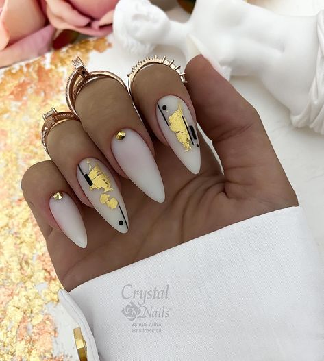 Almond Nails Designs Gold Flakes, Black White And Gold Nails Coffin, White Nails With Silver Foil, Milky White With Black Nails, Milky Nails Gold Foil, Milky White Nails Gold Foil, Almond Nails Black And Gold, White Gold Foil Nails, White Geode Nails