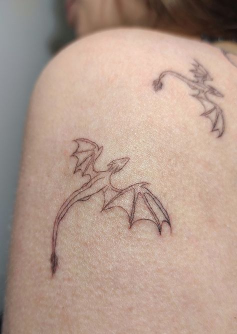 #tattoo #dragons #tattooforwoman Inst: A.Berger_tattoo Multiple Dragon Tattoo, Simple Wyvern Tattoo, Dragon Stick And Poke, Dragon Linework Tattoo, Tairn And Andarna Tattoo, Dainty Dragon Tattoo For Women, Inkbox Tattoo Ideas, Tiny Dragon Drawing, Abstract Fine Line Tattoo