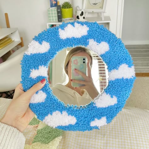 Circular cloud rug mirror in blue. Made using punch needle. Punch Needle Rug Supplies, Cloud Punch Needle, Punch Needle Mirrors, Mirror Punch Needle, Punchneedle Mirror, Mirror Tufting, Embroidery Clouds, Punch Needle Aesthetic, Tufting Mirror