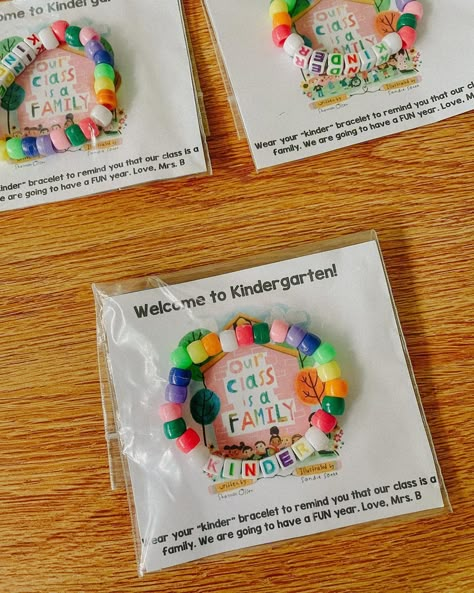 Emily on Instagram: “✨ Welcome gifts for my kindergarteners! ✨ We read Our Class is a Family and then I gave each of them matching bracelets that I handmade to…” Our Class Is A Family Classroom Theme, First Day Of School Art Kindergarten, Welcome To Kindergarten Gifts 1st Day, Last Day Of Kindergarten Gifts For Kids, Beginning Of The Year Activities 1st, Kindergarten First Day Gift, Last Day Of School Gifts For Kids, Welcome Back To School Gifts For Kids, Welcome To Kindergarten Gifts