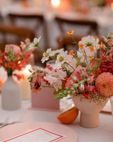 Not only do these vibrant flowers enhance the overall aesthetic of your wedding, but they also create a cheerful and celebratory atmosphere, setting the perfect mood for your special day. Adding a pop of fresh citrus ties the whole look together seamlessly! #weddingflowers #colorfulblooms #floraldecor #weddingreception #vibrantflowers #alinatoevents #brideandblossom #overthemoon #stylemepretty #colorfulflowers #weddingflorals #nycweddingplanner #weddingplanner Citrus Centerpiece, Citrus Wedding Theme, Overall Aesthetic, Nyc Luxury, Citrus Wedding, Ibiza Wedding, Cabo Wedding, Cabo Weddings, Banner Background