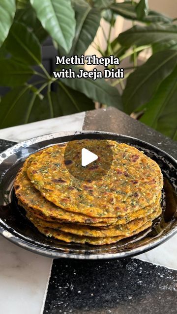 Saransh Goila on Instagram: "Most Delishaaas theplas I've had in my life have always been made by Jeeja didi (who's our star Marathi house help and also a fab cook) It's amazing how recipes can transcend boundaries a Gujarati recipe that is so popular all across that every household has their version and this isn't the OG way to make them but I love them. So we decided to share her Thepla recipe which she's been following for about two decades and while I can't roll those theplas like she does. I'd like to thank her for sharing her favourite recipe with us. How do you make them at home? 
.
.
Theplas 

3 Green chilies 
1 inch Ginger
Pound it into a paste 

Didi approved 😎🙂‍↕️

1/2 bunch Methi, chopped & washed 
1 tbsp Ginger & chili paste 
15g Jaggery 
1 tsp Red chili powder 
1 tsp Corian Thepla Recipe Methi, Methi Thepla Recipe, Thepla Recipe, Indian Breads, Indian Bread, Vegetarian Snacks Recipes, Chili Paste, Gujarati Recipes, Vegetarian Snacks