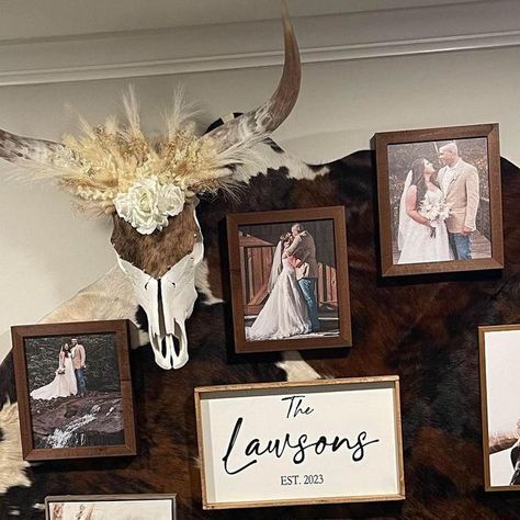 Courtney Cook on Instagram: "Thankful for customer pictures 🫶 Loving the inspiration for a wall in my new house 🥰 #courtneyscustomcowskulls #cowhide #longhorn #homedecor #bohowesternstyle #idaho #countrydecor #farmhousedecor #rusticdecoration #cowgal #viralpost #taxidermy #cowgirls #countrygirl #farmgirl" Cow Hide With Pictures On Wall, Cow Skull Wall Decor Ideas, Cowhide Picture Wall, Cowhide Rug Wall Decor, Cowhide Rug On Wall, Cow Hide Wall Decor Ideas, Cowhide Backdrop, Cowhide On Wall, Cowhide Wall Decor