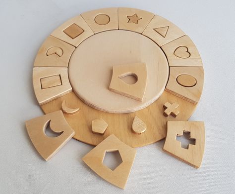 Wooden shapes puzzle pdf plans. This plans set will guide you how to make a shapes puzzle by scroll saw. Kids will love to play with this shapes puzzle. Wooden Shape Puzzle, Natural Wood Toys, Patterns For Kids, Wooden Toy Trucks, Wood Toys Plans, Wooden Toys Plans, Laser Cut Wood Crafts, Scroll Saw Pattern, Workshop Organization