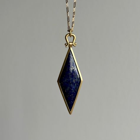 This otherworldly lapis pendant holds a galaxy within its sleek gold bezel, topped with Monika Krol's signature lyre bail. 18k yellow gold Lapis, 19.53ct, 15mm x 40mm (9/16" x 1 9/16")Chain is 23" long Wizard Jewelry, Faberge Jewelry, Gem Pendant, Lapis Pendant, Newport Ri, Allegiant, Jewelry Fashion Trends, Funky Jewelry, Girly Jewelry