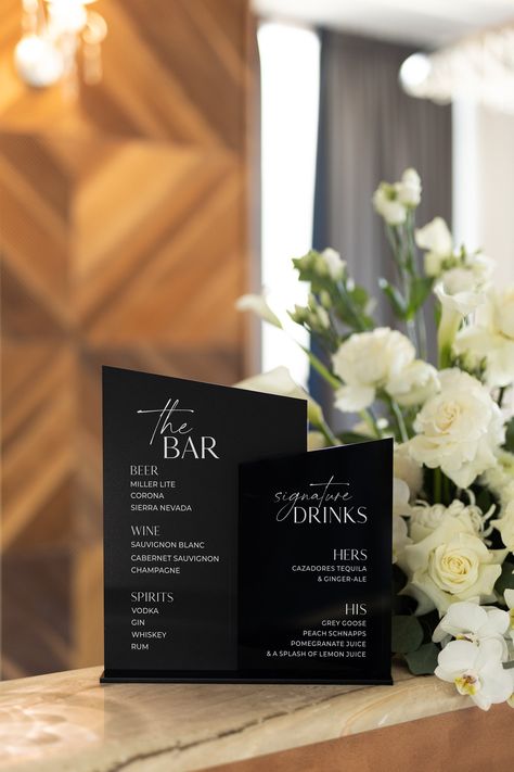 "Modern Black Acrylic Wedding Bar Sign - Signature Drink Sign - Wedding Bar Menu with Stand - Wedding Signage - Wedding Drink Menu Sign   Introducing our Modern Black Acrylic Wedding Bar Sign, the perfect addition to your wedding bar menu! Crafted from high-quality black acrylic, this elegant sign will add a touch of sophistication and modern style to your wedding reception. Featuring beautiful white lettering, this sign is designed to showcase your signature drink menu or bar menu in style. The Black Color For Wedding, Bar Area Wedding Reception, Black White And Gold Wedding Reception Decor, Black And White Acrylic Wedding Sign, Black And White Bar Sign Wedding, Wedding Sign Minimalist, Black Bar Sign Wedding, Modern Signature Drink Sign, Bar Menu Wedding Sign Acrylic