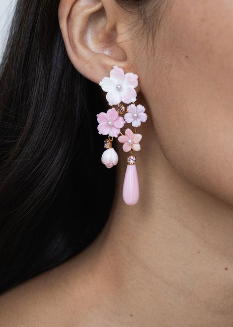 The Jeanie Earrings feature a cascade of florals, evoking the romantic charm of an Impressionist painting. Made by hand in New York, the organic variations in the pink-toned natural shell create an intriguing ombré effect, while the crystal details add sparkle. With a distinctive shape, these earrings make an undeniable statement, while remaining lightweight and comfortable to wear. Pink Christmas Clay Earrings, Dream Earrings, Jewelry Molds, Pink Statement Earrings, Beautiful Beaded Earring, Quilled Jewellery, Quirky Earrings, Jennifer Behr, Jewellery Moulds