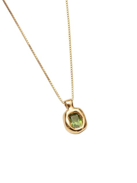 A NEW EVERYDAY FAVORITE WHAT IT IS: Elegant 14k gold vermeil necklace featuring a lab-created green sapphire WHY IT’S SPECIAL: This versatile piece serves as the perfect everyday staple We love the pop of mesmerizing green GOOD TO KNOW: 18" 14k Gold vermeil box chain14k Gold plated brass pendant with a lab-created green sapphire gemstone WHY WE LOVE WOLF CIRCUS: This line of demi-fine jewelry is crafted by hand in Vancouver, BC using a hand fabricated technique or the intricate lost-wax process. Silver And Emerald Necklace, Everyday Pendant Necklace, Necklace Stacks Gold, Green And Gold Jewelry, Elegant Gold Jewelry, Jewelry Accessories Necklaces, Green Sapphire Necklace, Necklaces Gemstone, Minimalist Gold Necklace