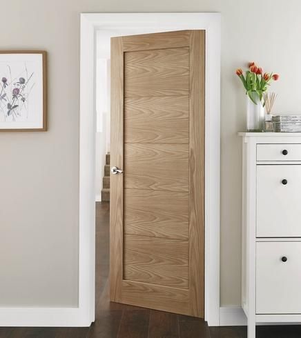 White Or Wood Doors, White Trim Natural Wood Doors, Natural Doors White Trim, White Oak Bedroom Doors, Wooden Doors With White Trim, Natural Wood Doors Interior Modern, Natural Wood Doors With White Trim, Modern Interior Wood Doors, Wood Doors White Trim Interior