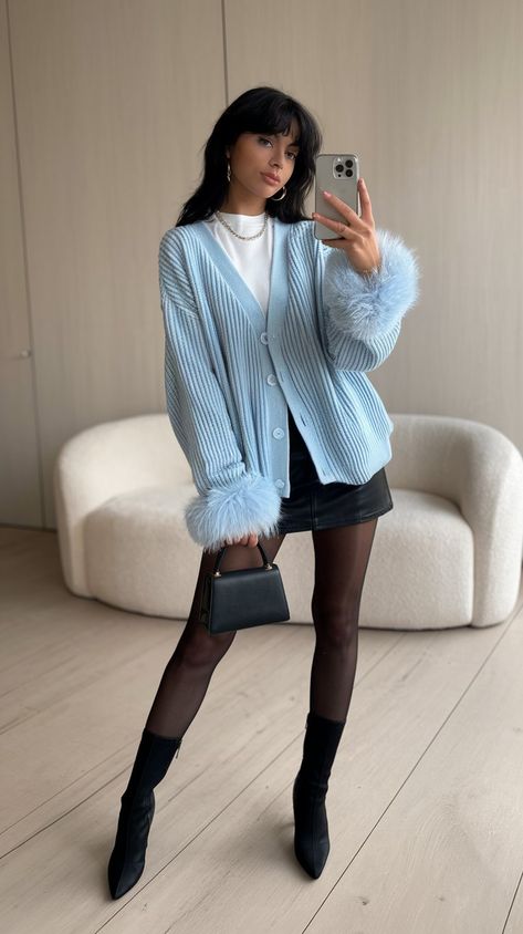 Step into the season with confidence in this trendy outfit! The light blue cardigan adds a pop of color, while the fluffy cuffs offer a unique flair. Paired with a classic black skirt and knee-high boots, this look is both fashionable and functional. Ideal for casual outings or stylish brunches, this outfit will keep you looking fabulous all winter long! #winterfashion #winteroutfit #cozyoutfit #fashioninspo #womanoutfitideas Light Blue Skirt Outfit, Blue Boots Outfit, Winter Brunch Outfits, Blue Outfit Winter, Crochet Cardigan Outfit, Blue Skirt Outfits, Brunch Outfit Winter, White Skirt Outfits, Light Blue Skirts