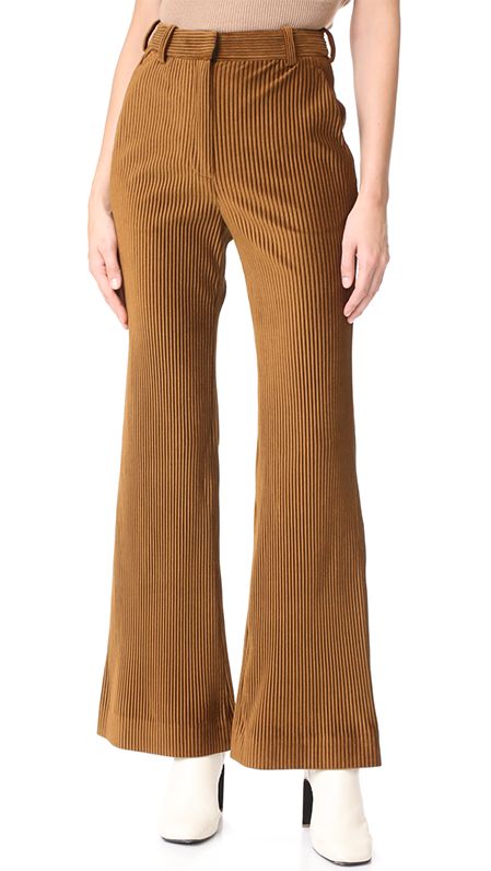 This Is Exactly What to Wear With Corduroy Pants | Who What Wear 70s Pants, Retro Pants, High Waisted Wide Leg Pants, 70s Outfits, Cloth Dress, Shirt Sweater, Velvet Pants, Ribbed Knit Sweater, Pants Design