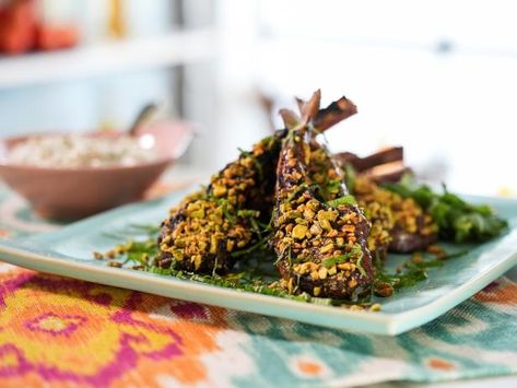 Get Pomegranate Glazed Lamb Lollipops with Feta Tzatziki Recipe from Food Network Lamb Lollipops Recipes, Springtime Meals, Pomegranate Lamb, Feta Tzatziki, Lamp Chops, Pomegranate Glaze, Lamb Lollipops, Tzatziki Recipe, Jeff Mauro