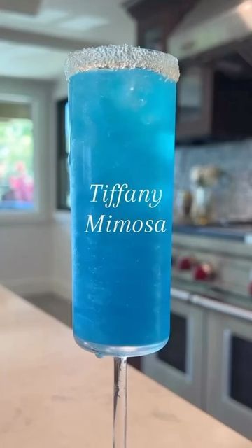 Tiffany Blue Mimosa, Tiffany Mimosa Recipe, Blue Brunch Food, Blue Mimosa Recipe, Tiffany Mimosa, Blue Mimosa, Mimosa Flight, Blue Alcoholic Drinks, Tiffany Themed Bridal Shower