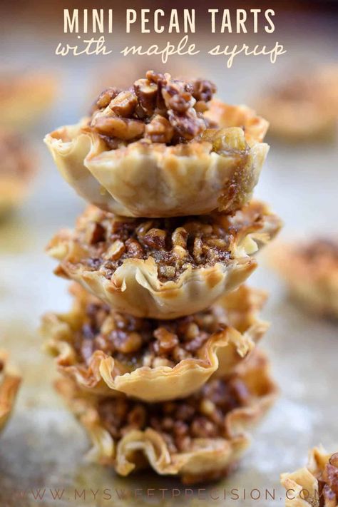 These mini pecan tarts are decadent and delicious. Made with phyllo shells and maple syrup, they are the perfect bite-sized appetizer or dessert for your next party. The crunchy pecans and gooey filling are reminiscent of a pecan pie but with fewer calories! Pecan Phyllo Cups, Appetizer With Phyllo Shells, Maple Pecan Tassies, Pecan Pie Phyllo Tarts, Pecan Pie Phyllo Cups, Phyllo Cup Dessert Recipes, Phyllo Tart Recipes, Mini Pecan Phyllo Tarts, Mini Pecan Pies In Phyllo