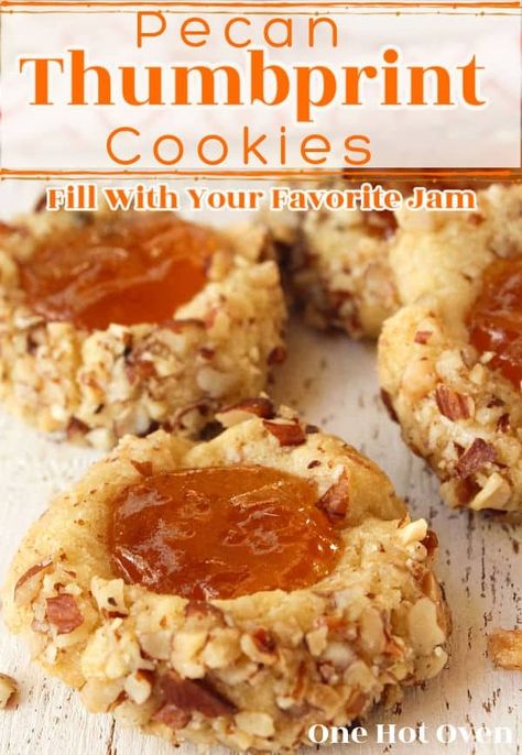 Are you looking for an easy pecan thumbprint cookies recipe to make for the holidays, or just because you love a good cookie.  Try this vintage thumbprint cookies recipe, and fill it with your favorite jam. Ham Thumbprint Cookies, Jam Thumbprints Recipe, Traditional Thumbprint Cookies, Thumbprint Cookies With Pecans, Jam Thumbprint Cookies Easy, German Thumbprint Cookies, Christmas Thumbprint Cookies Recipes, Thumbprint Cookies Cream Cheese, Classic Thumbprint Cookies Recipe