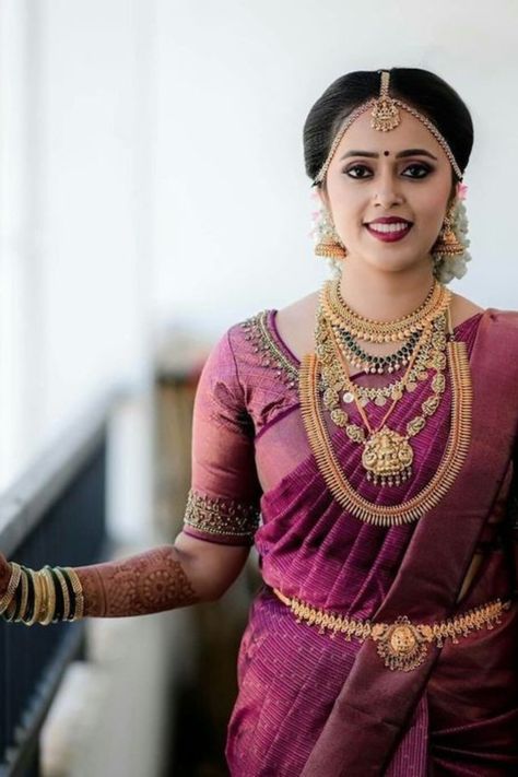 Find the best bridal makeup artists in your budget & desired city with contact information, portfolio & trusted reviews at Weddingbazaar - Trusted Wedding Services for Every Indian Wedding! #southindianwedding #southindianbride #southindianbridemakeup #southindianbridemakeuplook #southindianbridemakeover Purple Wedding Saree, Classy Bridal Makeup, Brides Saree, Engagement Sarees, South Indian Wedding Hairstyles, Reception Sarees, South Indian Wedding Saree, South Indian Bride Saree, Kerala Bride