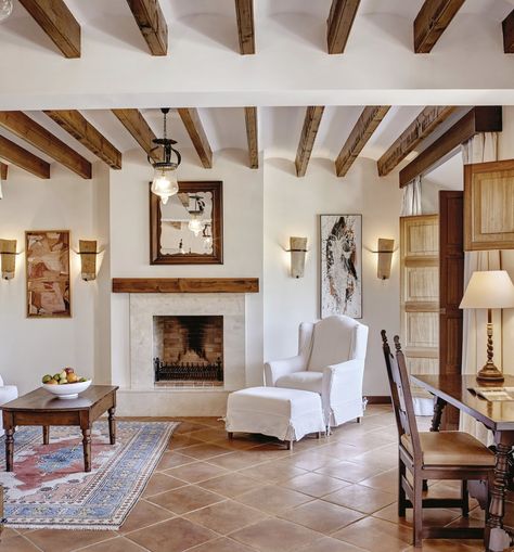 Spanish Style Home Renovation, Spanish Style Game Room, Living Rooms With Terracotta Floors, Spanish Floor Tiles Living Room, Spanish Tile Floor Living Room, Small Spanish House Interior, Small Spanish Style Homes Interior Decor, Small Spanish Style Kitchen, Saltillo Tile Living Room Modern