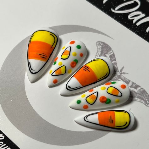 Welcome to LD Nails! 🖤 One set of 10 REUSABLE Press On Nails 🖤 🖤 Made to order in your shape & size 🖤 Candy Corn Delight: orange yellow and white Halloween themed press on nails with hand painted candy corn detailing! Purchase INCLUDES an application kit! It consists of: 🖤 detailed application & removal instructions 🖤 a sealed and sanitary mani kit (100/180 file, buffer block, cuticle pusher) 🖤 2 alcohol pads 🖤 nail tabs or glue (glue is standard, request tabs in the personalization box if you prefer them!) *Only one kit is sent per order. Extra kits and kit contents can be picked up here 👉 https://www.etsy.com/ca/listing/817160463/application-kit-press-on-nails-gothic Est. 2020: LD Nails specializes in custom Gothic, Witchy and Alternative Press On Nails. I draw inspiration from Nails Candy Corn, Candy Corn Nails, Cartoon Nails, Country Nails, Witchy Nails, White Halloween, Nail Candy, Nails Fake, Alternative Style