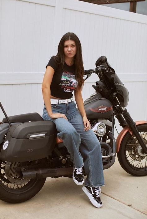 Girl hanging out by the motorcycle wearing Full Tilt Racing Car Baby Tee. Large graphic screened on front. Ribbed crew neckline. Short sleeve. Fitted silhouette. Cropped. 50% Cotton, 50% Polyester. Streetwear Fashion Simple, Vans Tshirt Outfits, Grunge Rock Outfits For Women, White Band Tee Outfit, Tough Girl Outfits, Shopping Outfits Casual, Cute Vans Outfits, Fitted Graphic Tee, Summer Long Sleeve Outfit