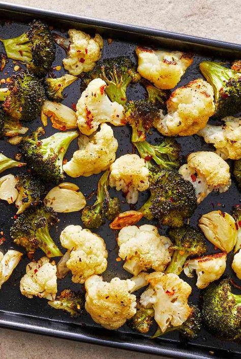 Roasted broccoli and cauliflower are perfectly cooked with simple seasonings and char from the oven. Enjoy this healthy recipe for any occasion. #healthyeating #healthyfoods #healthylifestyle #healthyrecipes Oven Roasted Vegetable Recipes, Broccoli And Cauliflower In Oven, Roast Cauliflower And Broccoli, Oven Roasted Broccoli And Cauliflower, Roast Cauliflower Recipes, Cauliflower Broccoli Recipes, Cauliflower And Broccoli Recipes, Broccoli And Cauliflower Recipes, Brussel Sprouts In Oven