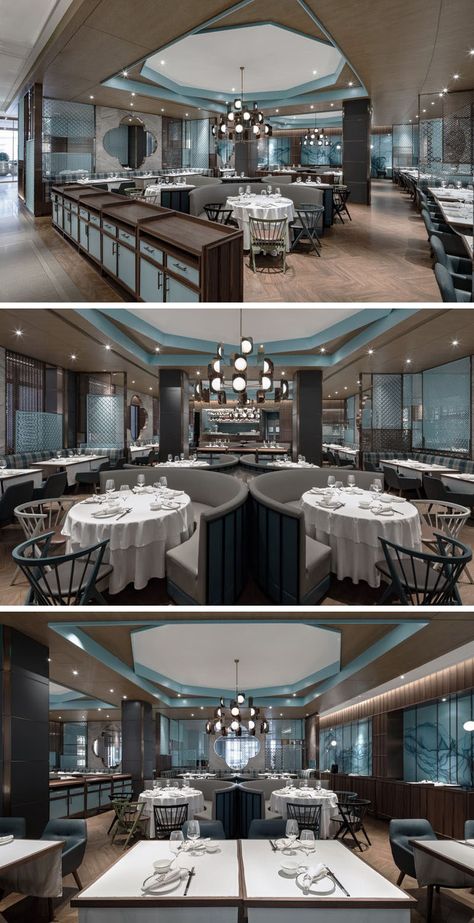 In the main dining area of this modern restaurant, a decagon ceiling feature and chandelier are positioned above curved seating booths. #RestaurantInterior #ModernRestaurant Restaurant Interior Design Plan, Dimsum Restaurant, Shanghai Restaurant, Seating Booth, Restaurant Booth Seating, Curved Seating, Ceiling Feature, Restaurant Plan, Interior Restaurant