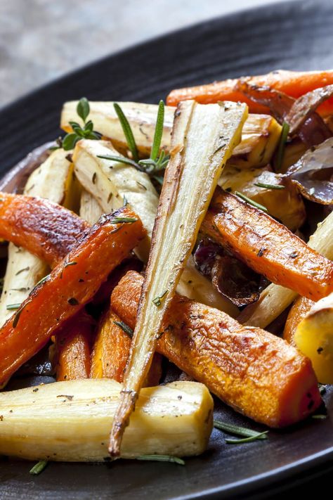 Oven-Roasted Carrots, Turnips, And Parsnips - For an added touch, add some chopped herbs (we like rosemary) to the oil before roasting the vegetables. Make sure the vegetables are cut to uniform size so they cook evenly (no one likes an overcooked turnip!). | CDKitchen.com Turnips And Parsnips Recipe, Ways To Cook Vegetables, How To Cook Turnips, Parsnips Recipe, Vegetables In Season, Roasted Turnips, Roasted Carrots And Parsnips, Parsnip Recipes, Oven Roasted Carrots