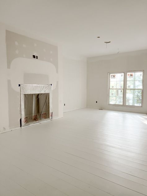 Our Pine Flooring is Painted - Deb and Danelle White Painted Wood Floors Living Room, White Floor Boards, White Floors White Walls, White Painted Wooden Floor, Painting Wood Floors White, Painted Floor Living Room, White Bedroom Flooring Ideas, Whitewash Pine Floors, White Wash Pine Floors