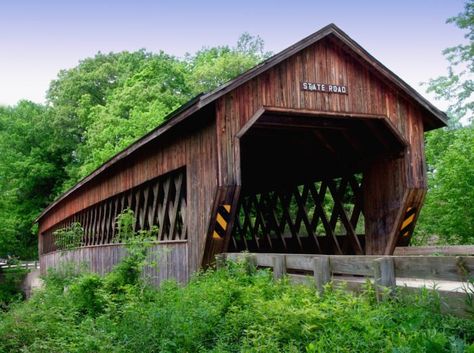 This 157-foot long bridge in Monroe Township is another one of the 16 drivable bridges in Ashtabula County. Ashtabula County, Fall Foliage Road Trips, Old Bridges, Road Bridge, Ohio Travel, Bridge Building, Covered Bridge, Northeast Ohio, Scenic Byway