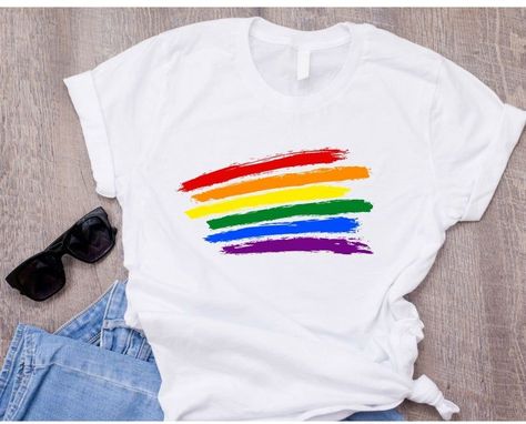 Wear our Love is Love Tee as a reminder that love knows no limits, embracing love in all its forms. #LoveKnowsNoBoundaries #LoveIsLoveFashion #InclusiveLove Rainbow Tshirt Diy, Pride Shirt Ideas, Pride Clothes, Shirt Upcycle, T Shirt Upcycle, Lesbian Shirt, Lgbtq Fashion, Pride Fashion, Lgbtq Clothing