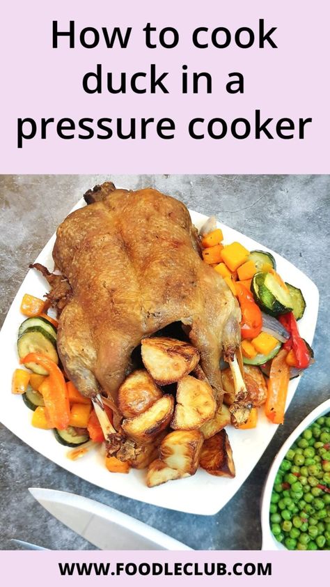 A duck cooked in the pressure cooker and browned in the oven on a plate with vegetables. Pressure Cooker Duck Recipes, How To Cook Duck In Oven, Instant Pot Duck, Duck Recipes Whole, Whole Duck Recipes, Cooked Duck, How To Cook Duck, Making Roast Potatoes, Fish Batter