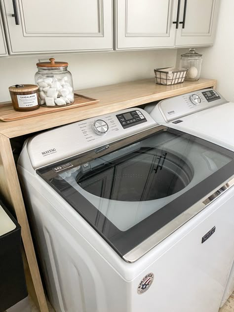 Laundry room shelf tutorial Top Open Washer Laundry Room, Laundry Room Shelf Behind Washer, Top Loader Washing Machine Room Ideas, Shelf Behind Laundry Machine, Washing Machine Shelf Diy, Laundry Room Behind Washer, Washing Machine Shelving, Laundry Room Over Washer And Dryer, Laundry With Top Loader Washing Machine