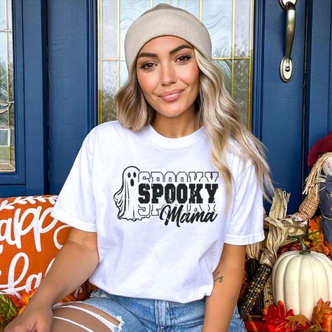 Whether you're a mom who adores Halloween or just loves expressing your unique personality, this tee is tailored for you. The "spooky mama" message not only showcases your playful spirit but also highlights the enchanting journey of motherhood. Embrace the magic of being a mom while celebrating your inner spooky queen with our "Spooky Mama" shirt – it's a must-have for all the enchanting moms out there who know how to balance spooky and sweet. Spooky Mama Shirt, Spooky Mama, Love Express, Being A Mom, Mama Shirt, Fort Lauderdale, Spooky Season, Halloween Shirt, Just Love