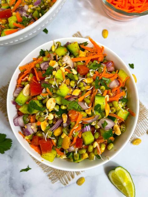 Easy, wholesome, and fresh, sprouted moong (mung) salad made from sprouts, fresh vegetables, herbs and, seasonings. Vegan, gluten-free, and oil-free.