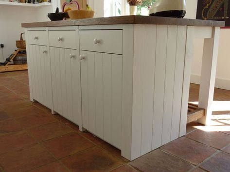 Like the vertical lines on the cupboard & the wooden counter top.  Note far side of island. White V Groove Kitchen, Kitchen Cabinets Vertical Lines, Tongue And Groove Kitchen Cabinets, Tongue And Groove Backsplash Kitchen, Tongue And Groove Cabinet Doors, Kitchen Tongue And Groove, Tongue And Groove Kitchen, Annex Kitchen, Kitchen Cupboards Design