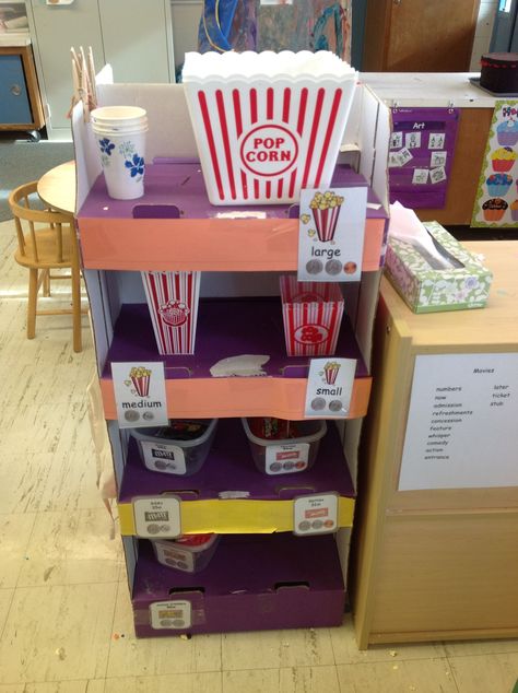 Movie theater at Pleasant View Preschool - popcorn (small, medium, large) and candy at the theatre Dramatic Play Movie Theater, Movie Theatre Dramatic Play, Movie Theater Dramatic Play, Preschool Dramatic Play, Dramatic Play Themes, Purposeful Play, Role Play Areas, Dramatic Play Preschool, Dramatic Play Area